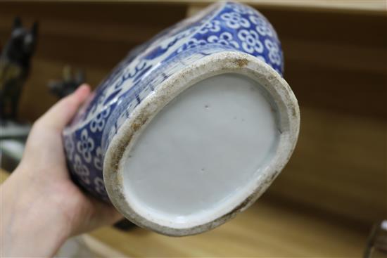 A Chinese blue and white moon flask decorated with dragons